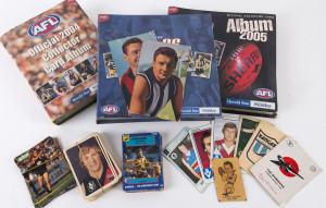 Various card sets in the appropriate albums: 1997 and 1998 Herald Sun Footy Albums, 2002 Herald Sun Stickers, 2004 Herald Sun AFL Collector Card album, ditto for 2005 and 2006 plus various other part sets, loose items, a few autographed letters, etc., including cricket items. Untidy, and in mixed condition but well worth viewing. (100s).