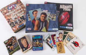 Various card sets in the appropriate albums: 1997 and 1998 Herald Sun Footy Albums, 2002 Herald Sun Stickers, 2004 Herald Sun AFL Collector Card album, ditto for 2005 and 2006 plus various other part sets, loose items, a few autographed letters, etc., inc