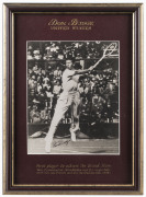 AMERICAN MALE TENNIS GREATS: A group of four superbly annotated and framed signed photographs featuring Don Budge (with CoA), John McEnroe (with CoA), Stan Smith (with CoA) and Jimmy Connors (with CoA). Also, an unsigned framed photo of Arthur Ashe. Each