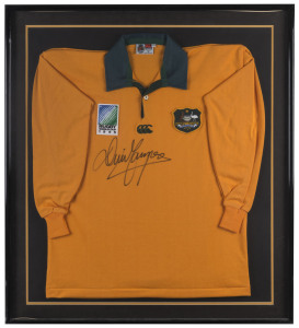 DAVID CAMPESE, display comprising a strong signature on a Wallabies 1995 World Cup Jersey, framed & glazed; overall  94 x 83cm.