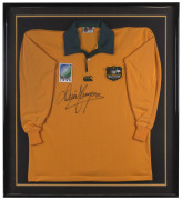 DAVID CAMPESE, display comprising a strong signature on a Wallabies 1995 World Cup Jersey, framed & glazed; overall&nbsp; 94 x 83cm.