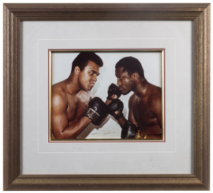 Signed photograph of Muhammad Ali and Joe Frazier as they face off before their "Fight of the Century" in 1974 (both signatures somewhat faded); also a signed Mike Tyson photograph (also faded). Both framed & glazed. (2 items). Both with CoAs.