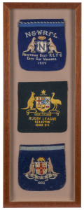 AN IMPRESSIVE DISPLAY OF 1930's RUGBY LEAGUE JACKET POCKETSThe display comprises of a 1932 New South Wales Rugby Football League pocket, a 1933-34 Australian Rugby League Selector's green & gold pocket and a 1937 Newtown District R.L.F.C. City Cup Winners 1937 pocket. All are in good condition with rich colours and intact stitching. (3). Overall 66 x 24cm.