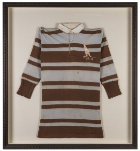 BILL KELLY'S AUSTRALIAN TEST TEAM JERSEY, 1914with a kangaroo and the year embriodered in silk on the left breast; framed & glazed; overall 99 x 88.5cm.A highly important and extremely rare relic from the second tour to Australia and New Zealand of the Great Britain Lions. Born in Westport, New Zealand in 1892, Kelly played first class rugby union for Buller when he was 18 and later represented Wellington.He switched to rugby league with the launch of the Wellington Rugby Lea