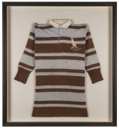 BILL KELLY'S AUSTRALIAN TEST TEAM JERSEY, 1914with a kangaroo and the year embriodered in silk on the left breast; framed & glazed; overall 99 x 88.5cm.A highly important and extremely rare relic from the second tour to Australia and New Zealand of the Gr