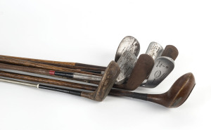 A group of (8) vintage golf clubs; 4 with hickory shafts, including a Cann & Taylor "Autograph" putter; a William Gibson & Co No.1 Iron and a "Bee-line" 4 Iron; a Sure-Shot Special No.4 Iron; a George Duncan "The Akros Model Niblick; a Gibsons Triple Star fancy face driver; and 2 others. Mixed condition.