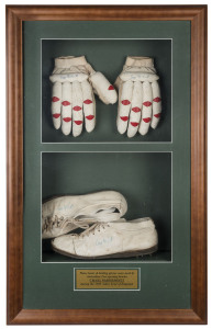 CRAIG McDERMOTT: A display featuring McDermott's boots and batting gloves (all signed) as used during the 1985 Ashes Tour of England. Framed & glazed, overall 86 x 52cm.