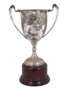 1995 TURNBULL STAKES TROPHY, silver-plated cup engraved "TURNBULL STAKES, Flemington, 1995", on timber plinth. [Won by All our Mob, ridden by Wayne Harris].