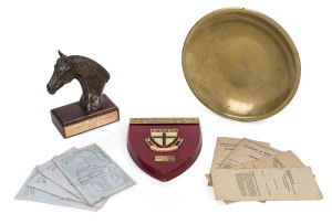 BOB HOYSTED COLLECTION: Group of fourteen items including trainer's trophy for 1982 Gold Nugget Stakes; trophies awarded by Australian Trainer's Association, 3DB Radio Station & St.Kilda Football Club; Certificates of Registration (8) including Sydeston and Love A Show; Sydeston saddlecloth and framed & glazed photograph display