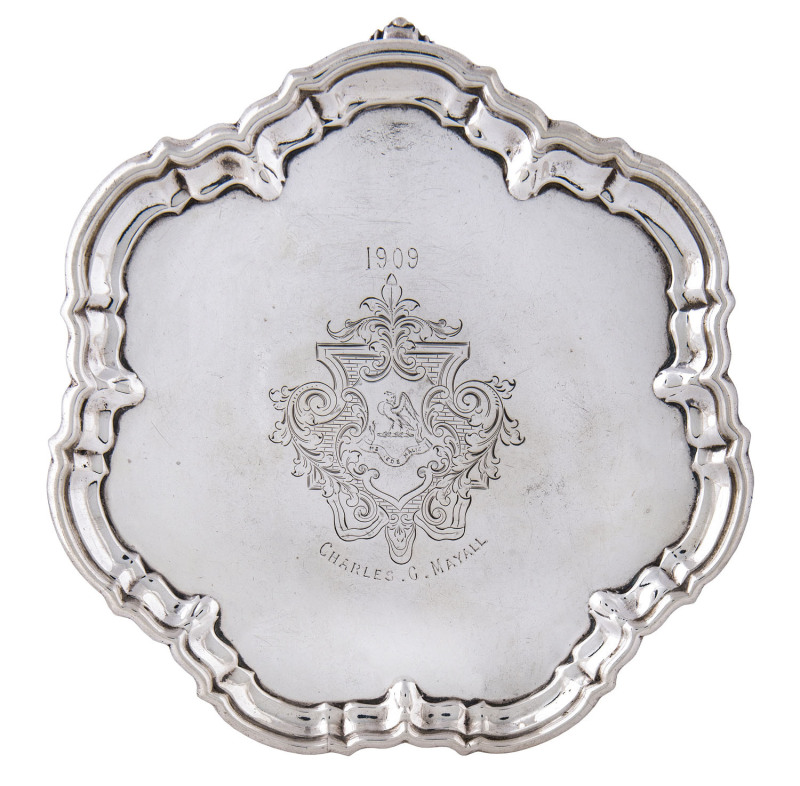 An English sterling silver salver with engraved crest presented to "Charles G. Mayall, 1909", by Walker & Hall, London, 1908,