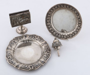 A silver dreidel, silver matchbox stand and two silver dishes, 20th century,
