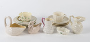 Belleek Irish porcelain group of tea ware, swan vases, jugs and sugar bowl, 19th and 20th century,