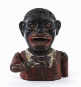 Antique American cast iron money box, early 20th century, 17cm high.
