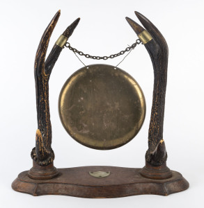 A dinner gong, deer antler and brass mounted on oak, late 19th century,