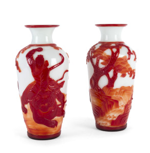 A pair of Peking cameo glass red and white vases, early 20th century,