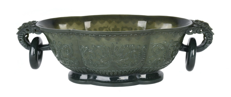 A Chinese carved spinach jade lobed oval bowl, Qing Dynasty, 19th century,