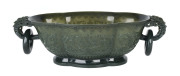 A Chinese carved spinach jade lobed oval bowl, Qing Dynasty, 19th century,