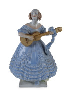 HEREND Porcelain figure of a woman playing guitar, mid 20th century,