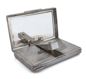 An Art Deco Continental silver ladies compact, circa 1925,