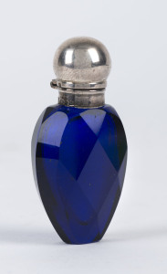 A cobalt blue faceted glass scent bottle with sterling silver top by Charles May, Birmingham, circa 1890,