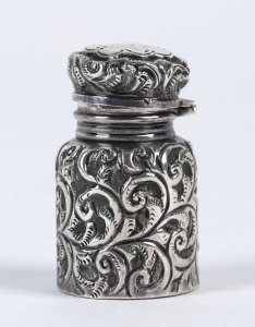 A squat cylindrical embossed sterling silver scent bottle by Charles May, Birmingham, circa 1892,