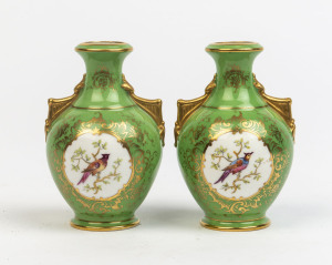 A pair of Coalport miniature porcelain vases on green grounds, late 19th century,