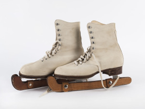 A pair of vintage ice skates, fine kid leather with stitched leather soles and blade covers, early 20th century,