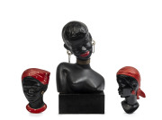 Ceramic Negress&nbsp;bust on timber stand and two wall busts, mid 20th century,