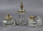 Two French crystal jars and an ashtray with bronzed figured adornments, circa 1920,