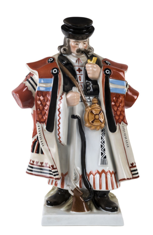 Herend porcelain figure of a man smoking a pipe, mid 20th century,