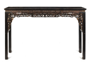 A Chinese altar table, carved and lacquered wood, 19th century,