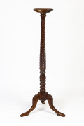A Georgian style&nbsp;torch&egrave;re, carved mahogany, 20th century,