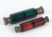 Two double-ended scent bottles, green and ruby glass with silver caps, 19th century,