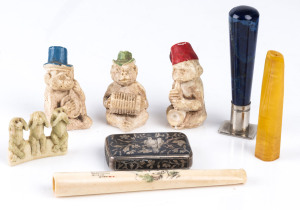 Silver niello vesta, lapis lazuli seal, ivory, amber and ceramic ornaments and cigarette holders plus timber box, 19th and 20th century
