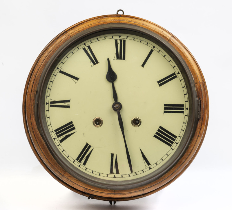 A circular station clock, walnut case with Roman numerals, 19th century
