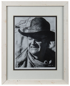 JOHN WAYNE signature on Universal Pictures press photograph from the set of True Grit, COA included