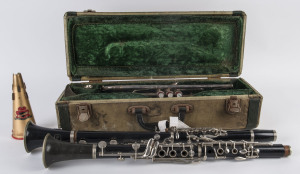 A vintage trumpet in case; together with two clarinets (missing on mouthpiece), early 20th century,