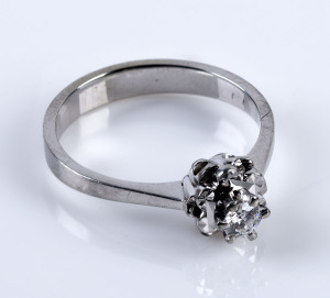 An 18ct white gold and solitaire diamond ring, with valuation ($1280)