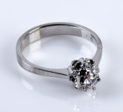 An 18ct white gold and solitaire diamond ring, with valuation ($1280)