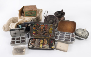 Vintage fishing gear including fly reels and assorted flies, early to mid 20th century,