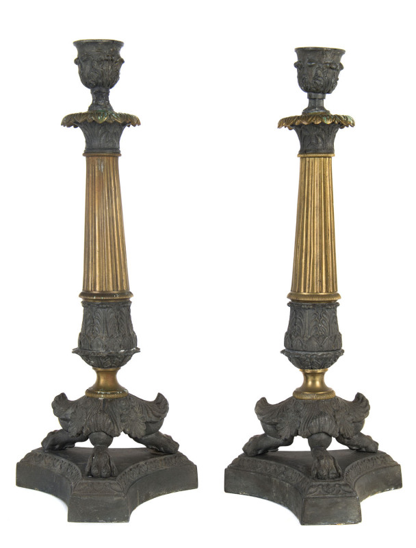 A pair of Empire style candlesticks, cast metal and brass, 19th century,