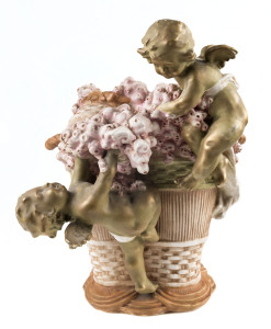 AMPHORA Pottery vase adorned with cherubs and flowers, Austrian, circa 1900,