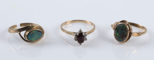 Three 9ct gold rings set with opals, garnet and diamonds,