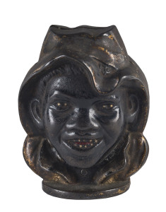 An American double-sided money box, painted cast iron, circa 1900,