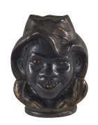 An American double-sided money box, painted cast iron, circa 1900,