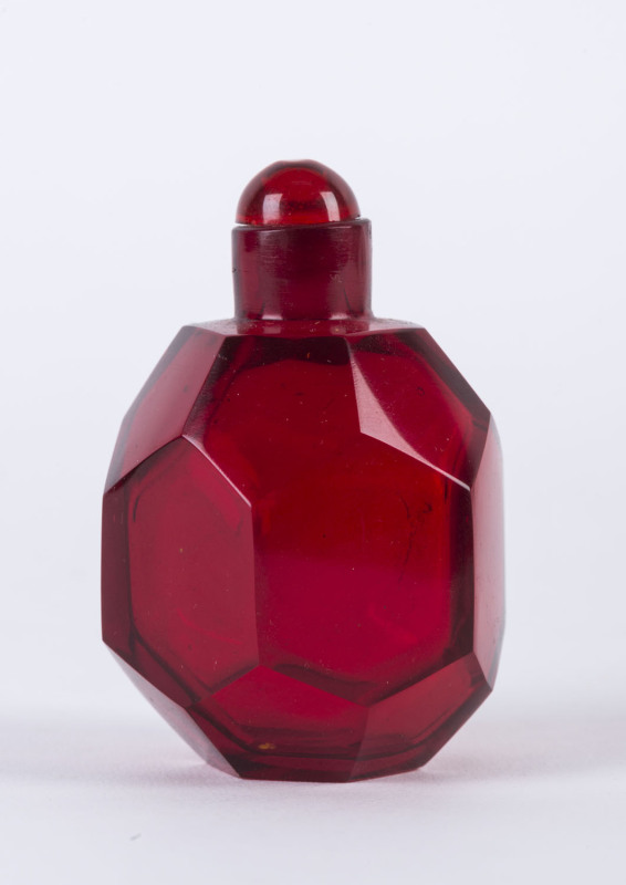 A Peking glass ruby faceted scent bottle, 20th century,