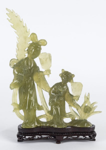 A Chinese carved jade figure group of Guan Ying on a wooden stand, 20th century,