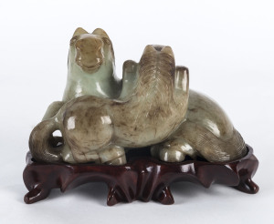 A Chinese carved jade horse figure group on stand, 20th century,