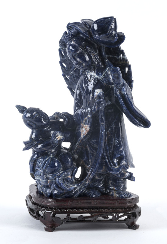 A Chinese carved lapis lazuli figure group on stand, 20th century,