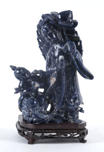 A Chinese carved lapis lazuli figure group on stand, 20th century,